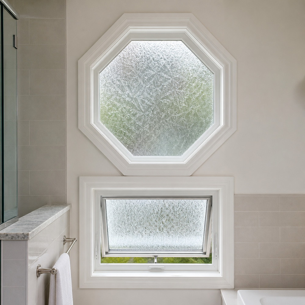 Octagonal privacy-glass window with small awning below in a bright bathroom